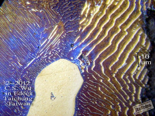 Note upper right area, Cementite protrudes from Ferrite for about 1 to 2 um.