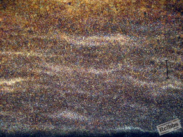 Streaks of carbide-rich areas.
