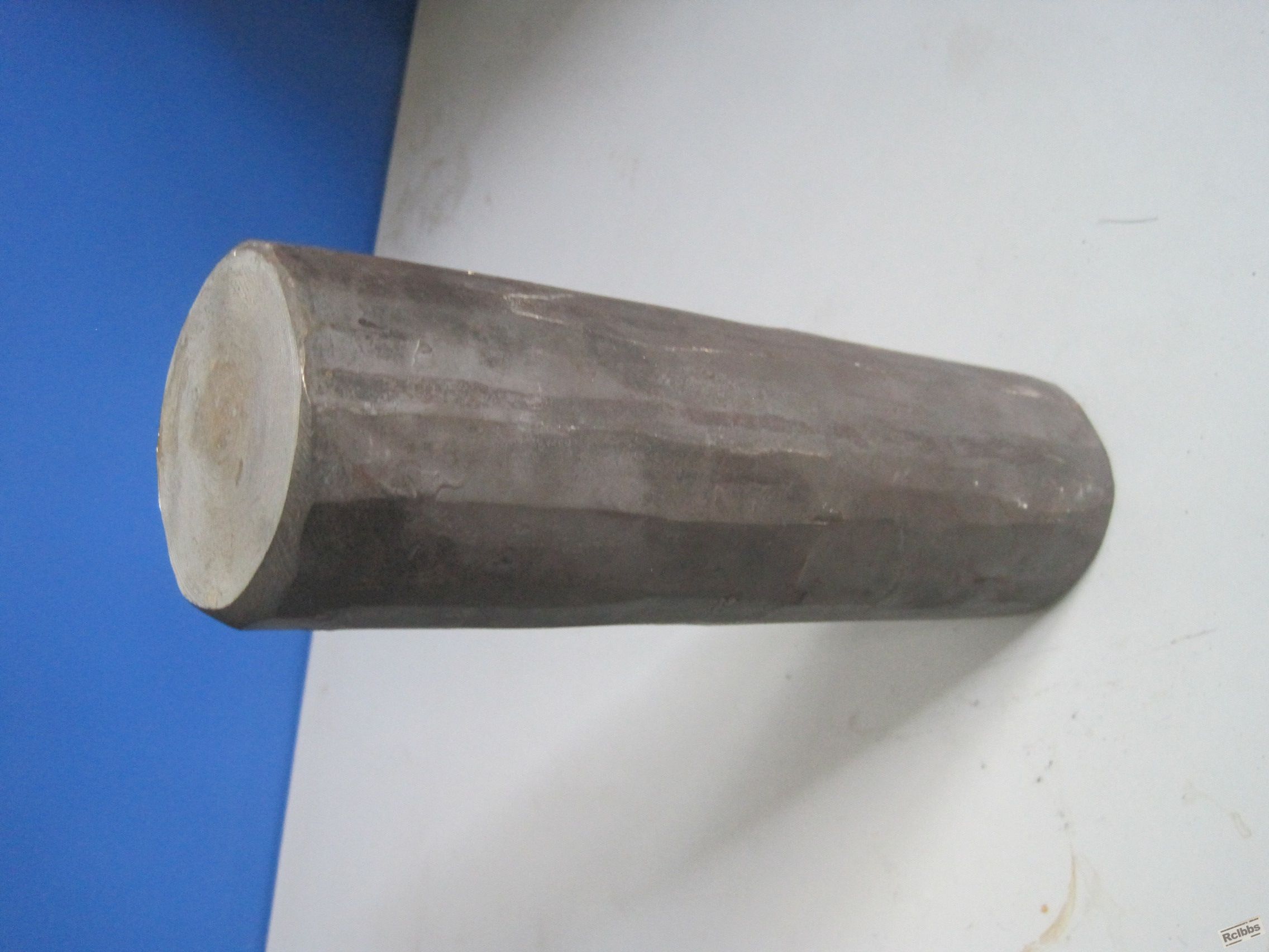 锻打成圆棒料.JPG