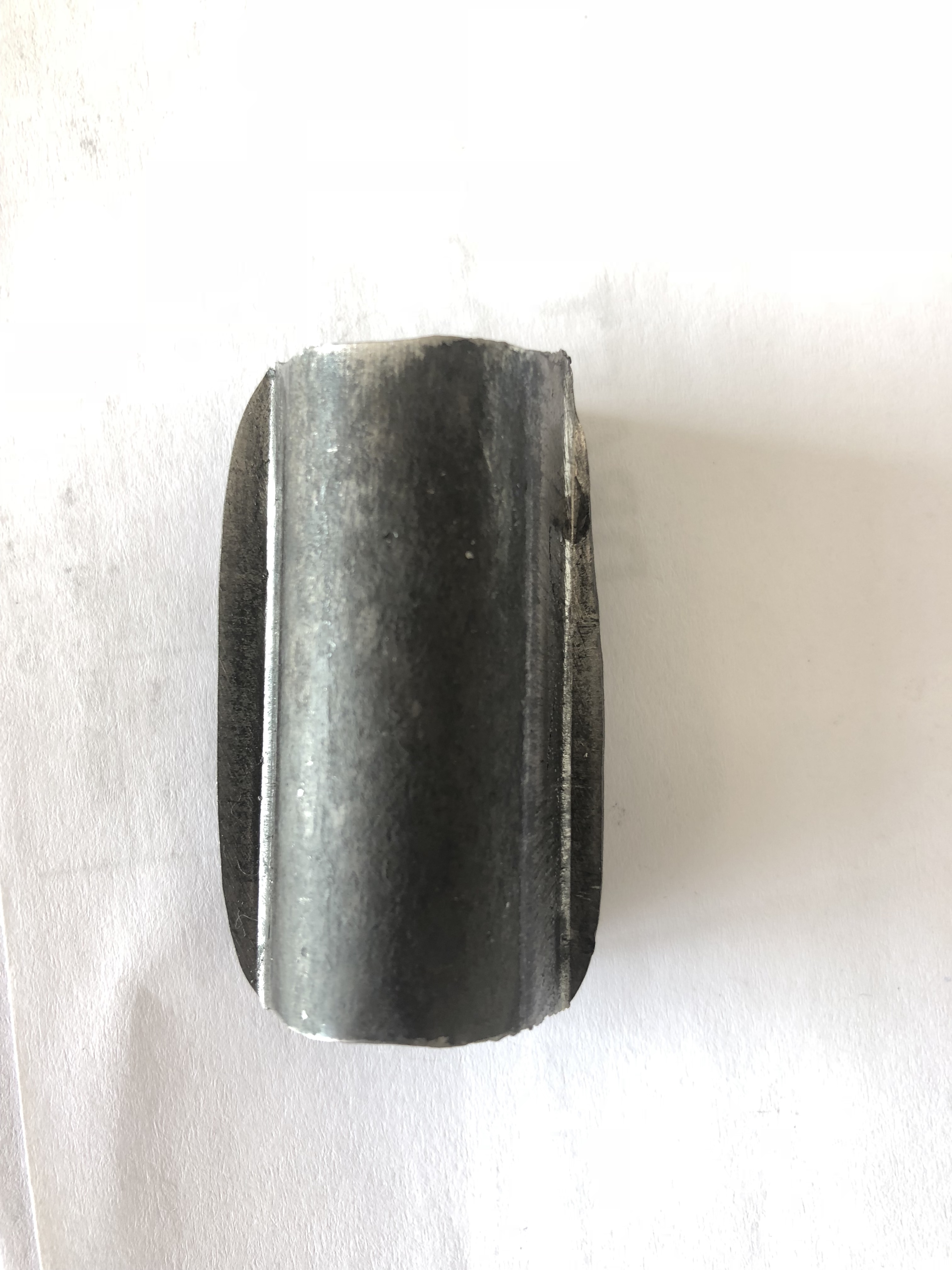 压制后钢套纵截面