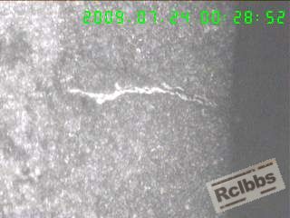 100X横截面表层裂纹约0.20MM(1#浸蚀).jpg