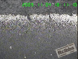 100X(横截面)断口附近处裂纹处组织,大量块状碳化物堆集,深度约0.30MM,.jpg