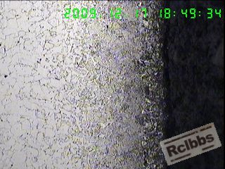 100X纵截面表层增碳约0.35MM,过烧层约0,10MM,次层为全脱碳层,.jpg