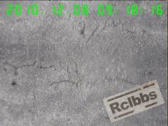 100X纵截面断口处形貌,偏析带晶间裂纹.jpg
