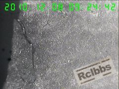 100X纵截面断口处形貌,断口偏析带裂纹.jpg